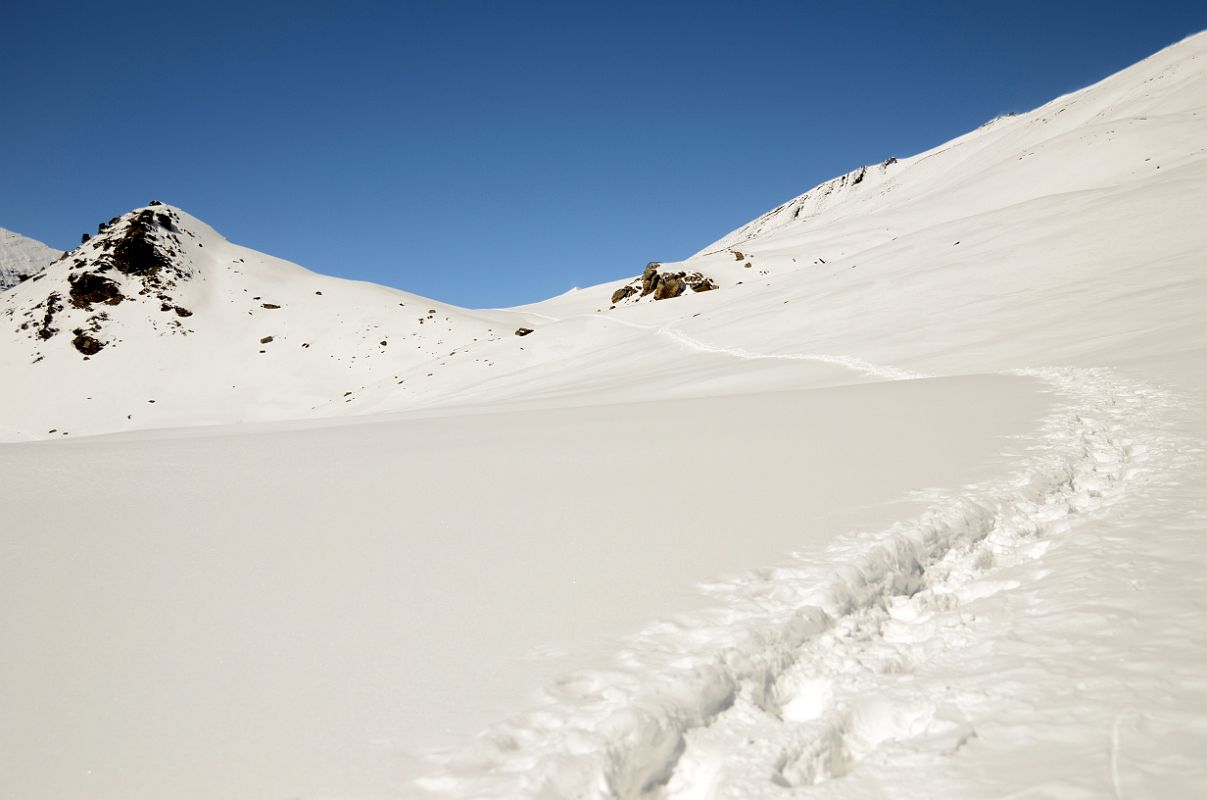 10 Long Trudge Through The Snow Continues From The Top Of The Ridge Above Yak Kharka Towards Kalopani Around Dhaulagiri 